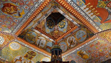 Ornately painted synagogue ceiling.