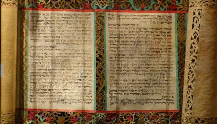 illuminated scroll with hebrew