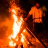 jewish man by bonfire in mt meron, israe