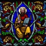stained glass window depicting a king holding a sword and a book