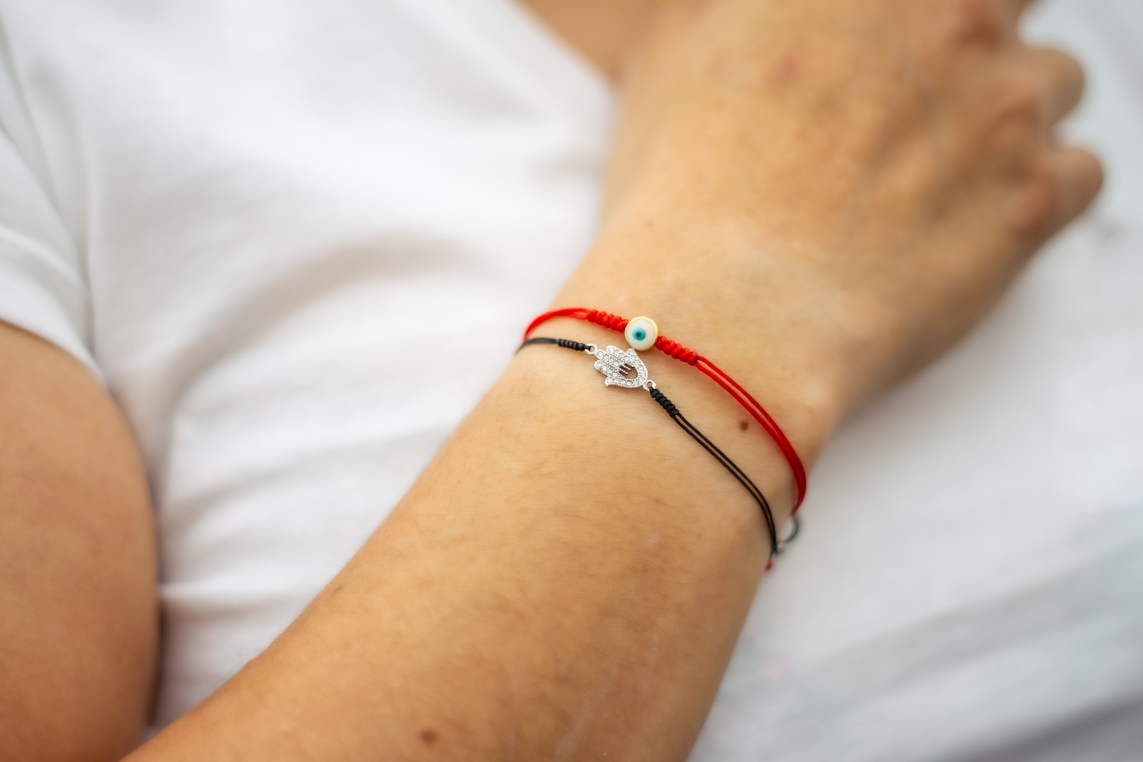 The History Of The Red String Bracelet  How to Use It  Karma and Luck