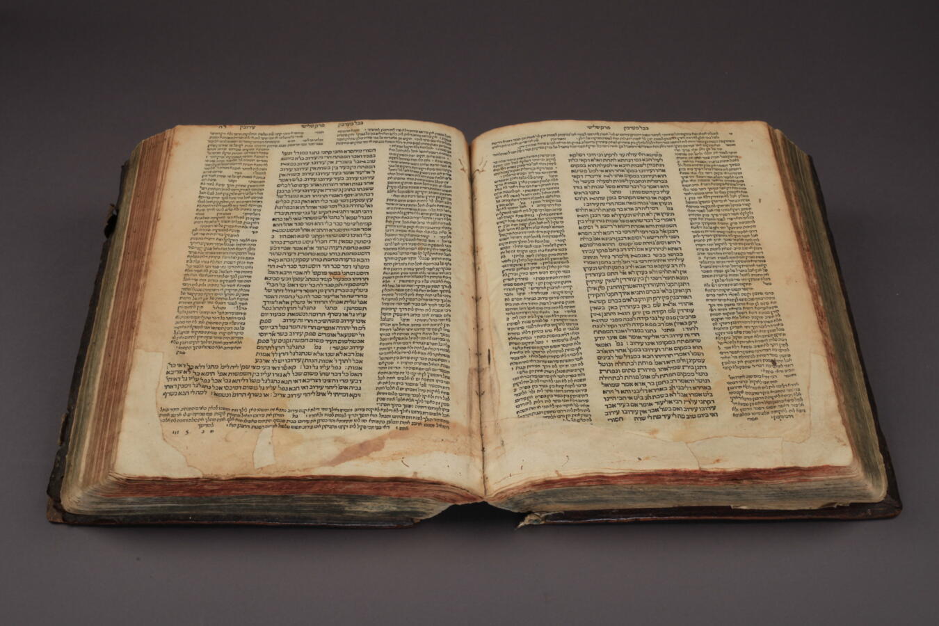 An old book with Hebrew lettering, open.