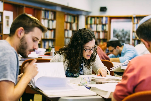 Students studying Jewish texts in the beit midrash (study hall) Mechon Hadar, an educational institution in New York City working to empower Jews to create and sustain vibrant, practicing, egalitarian communities of Torah learning, prayer and service. (Emil Cohen/Mechon Hadar)