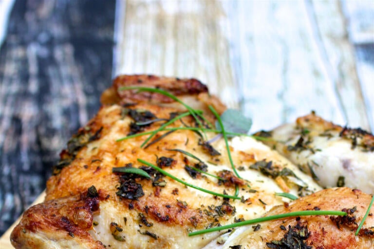 Easy spatchcock chicken recipe with garlic and herbs.