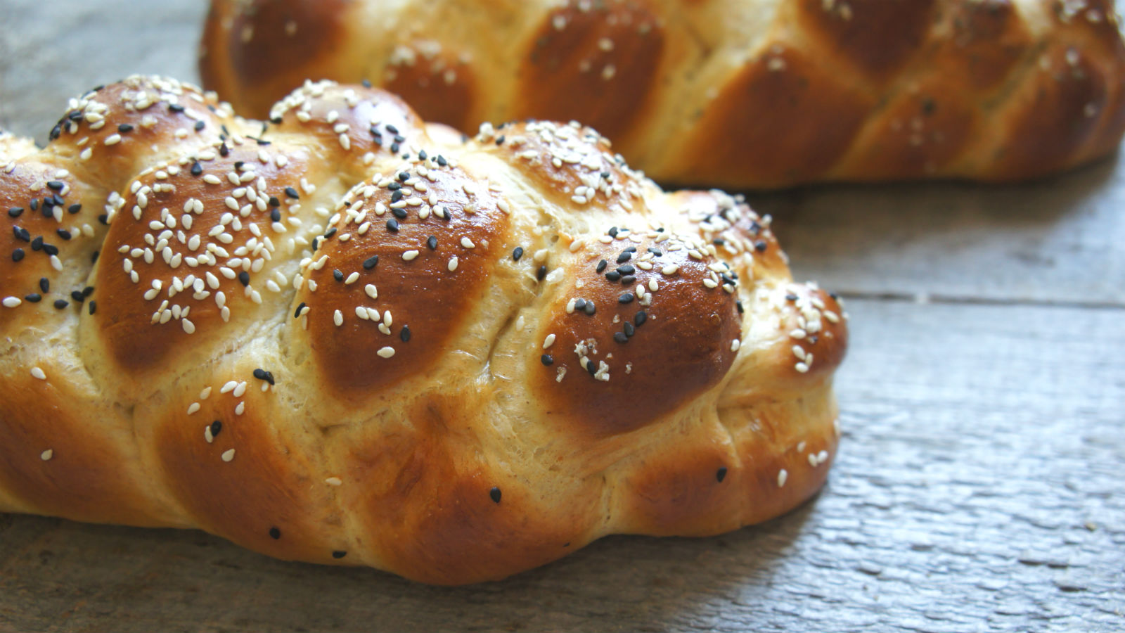 Challah a little too big for the pan but smells great! : r/Breadit