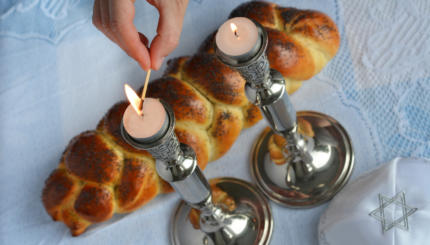 lighting shabbat candles