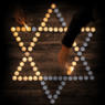jewish star in candles