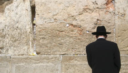A man prays at the Wailing Wall in Jerusalem