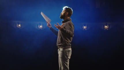 Actor performing a monologue in a theater