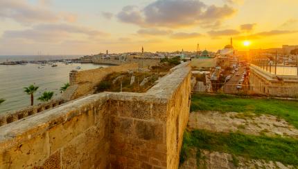 Sunset View With Skyline, Walls And Fishing Port, In The Old Cit
