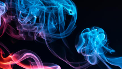 Colorful steam on a black background.