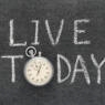 Chalkboard that says "live today."