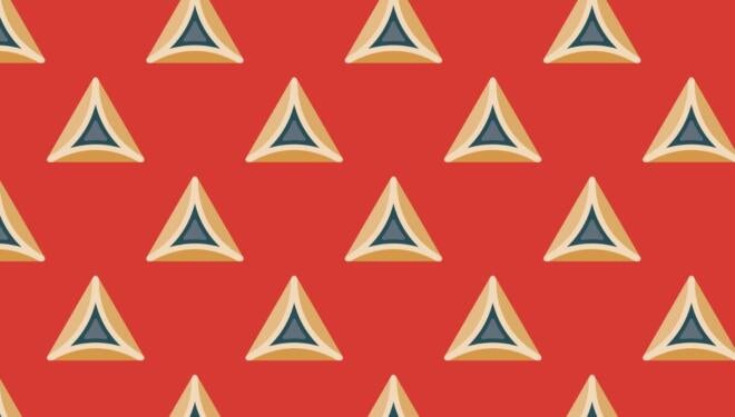 traditional hamantaschen on red background for the Jewish holiday of Purim