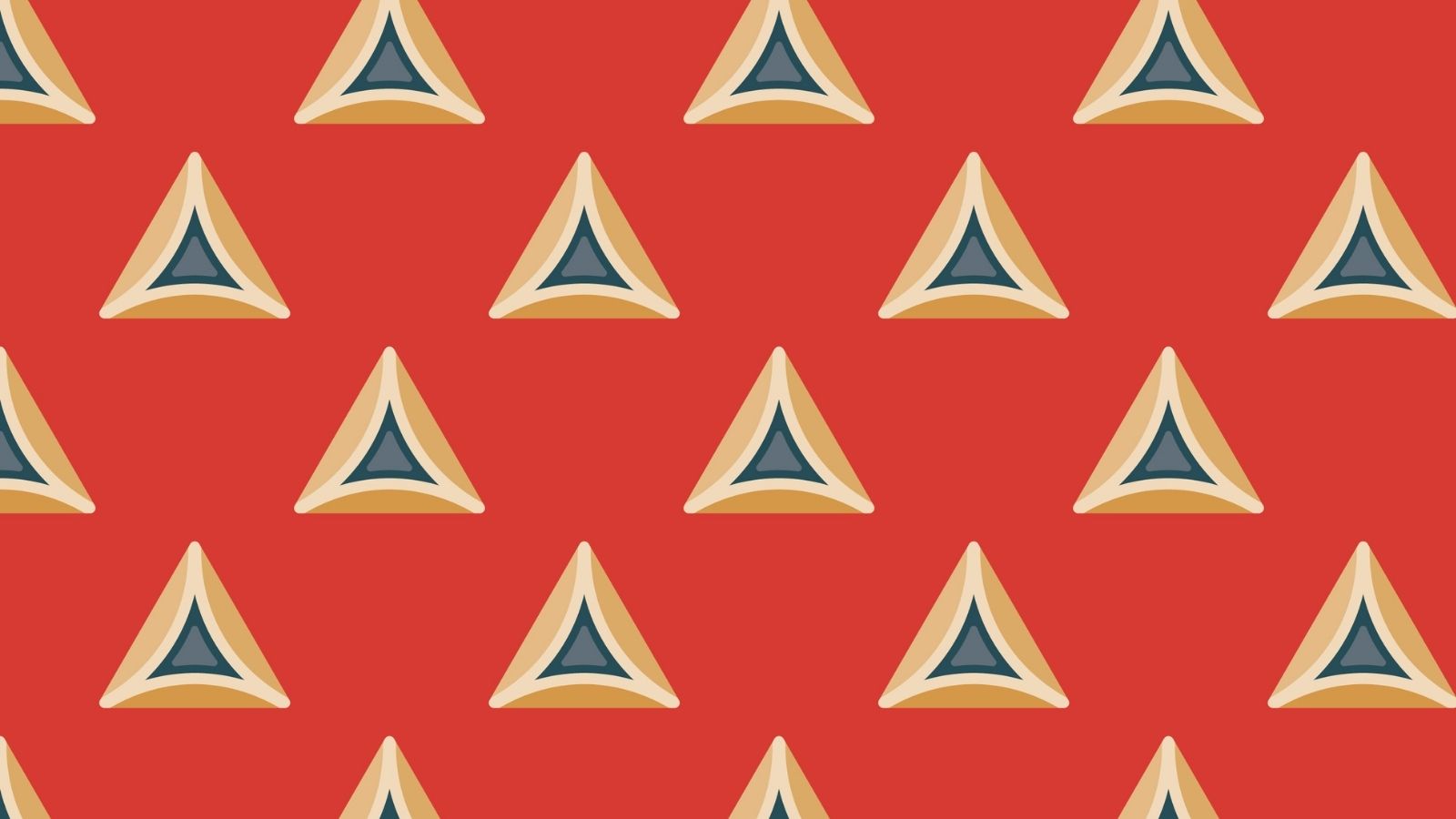 traditional hamantaschen on red background for the Jewish holiday of Purim