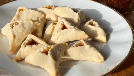 Vegan hamantaschen for Purim with jam