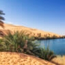 Umm el Ma (Mother of the Water) is about 800 meters long stretched lake in the Libyan part of the Sahara in the Fezzan Awbari. The oasis formed by the lake will be saved from numerous underground water reservoirs. The salinity of the lake rises to 34%.