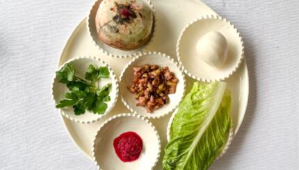 A vegan seder plate for Passover, including an alternative vegetarian shankbone