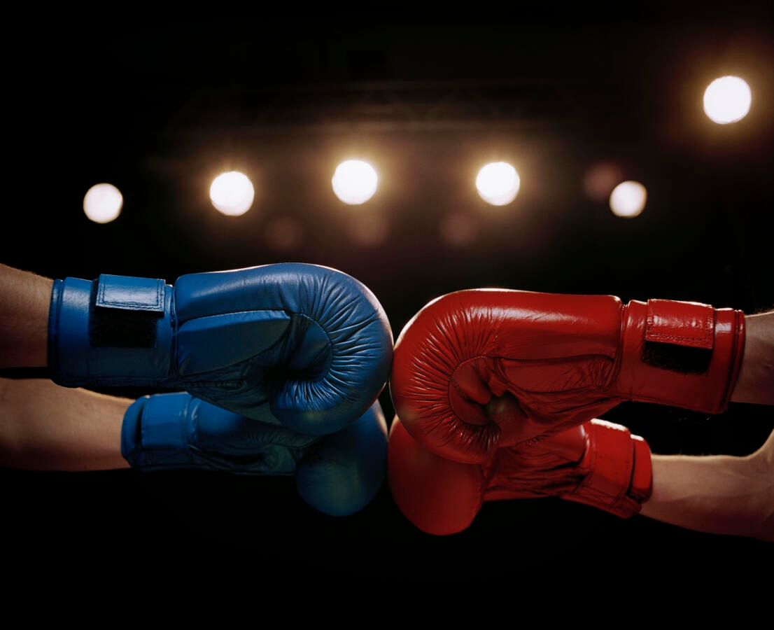 photo of red and blue boxing gloves