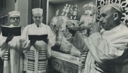 Jews Mark High Holy Days; Rabbi Albert Pappenheim and Cantor David Greengarten assist ritual directo