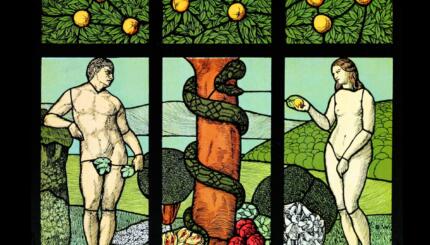 Stained glass showing Adam and Eve and the serpent.