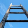photo of a ladder pointing into the sky