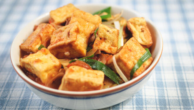 Close-Up Of Tofu With Sauce In Plate