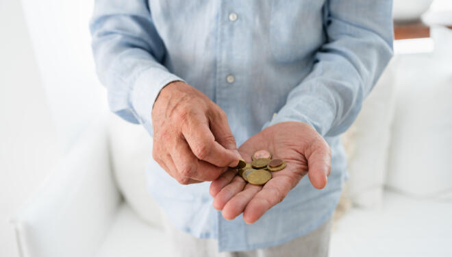 Man showing euro coins