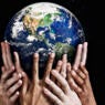 Hands cradling Mother Earth against starfield background