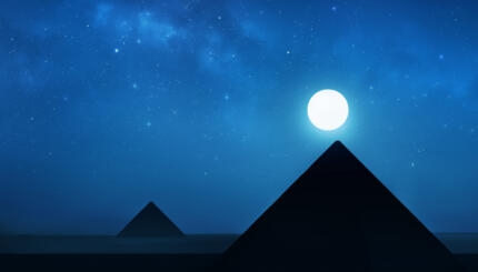 Pyramids by the light of a full moon.