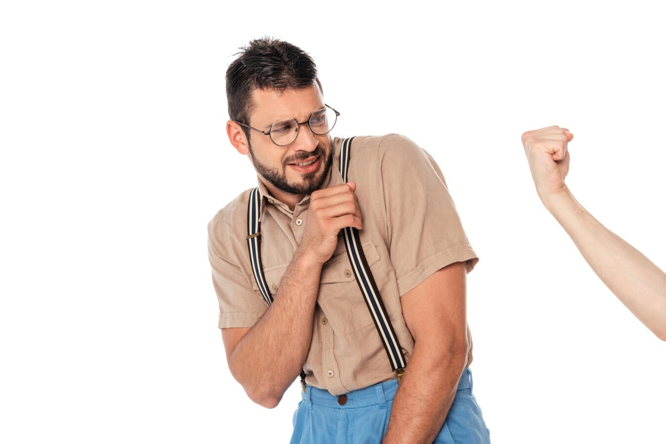 Man cringing in front of someone else's fist.