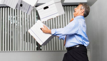 Man dropping boxes.