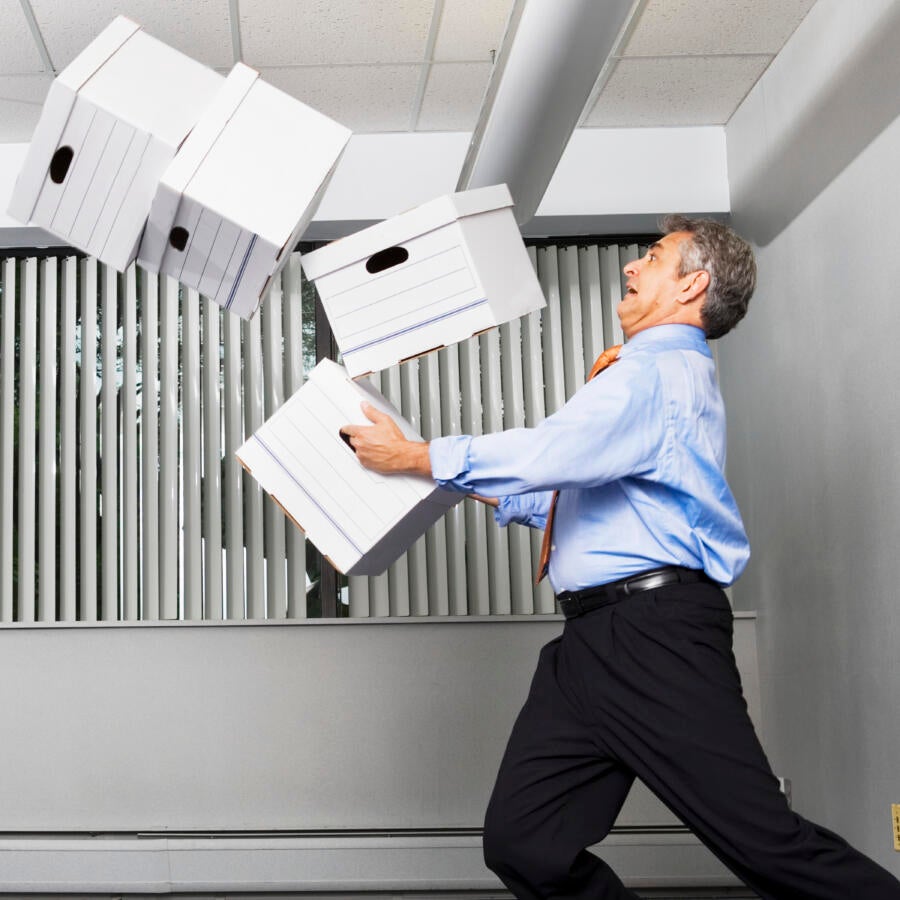 Man dropping boxes.