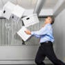 Man dropping boxes.